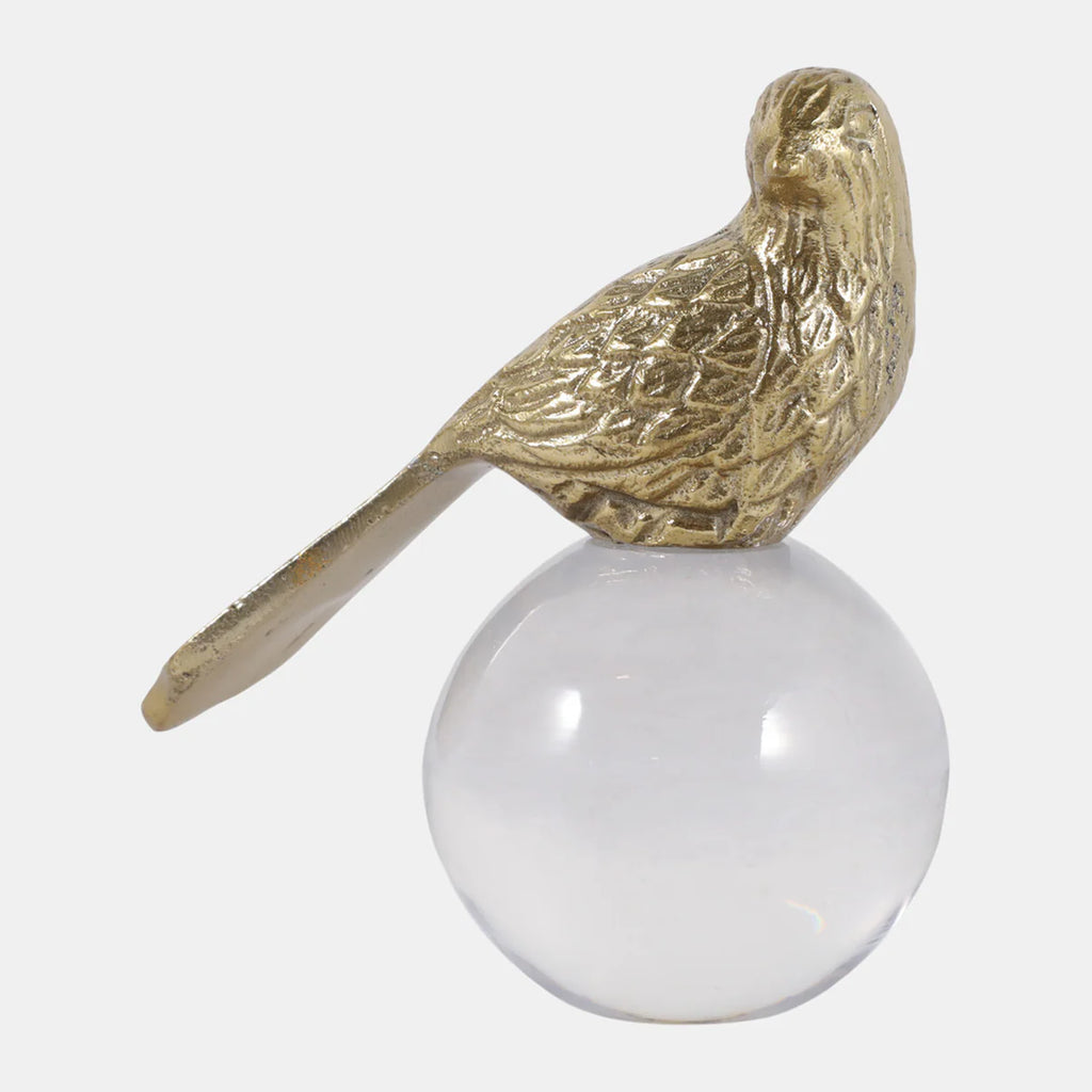 Gold bird perched