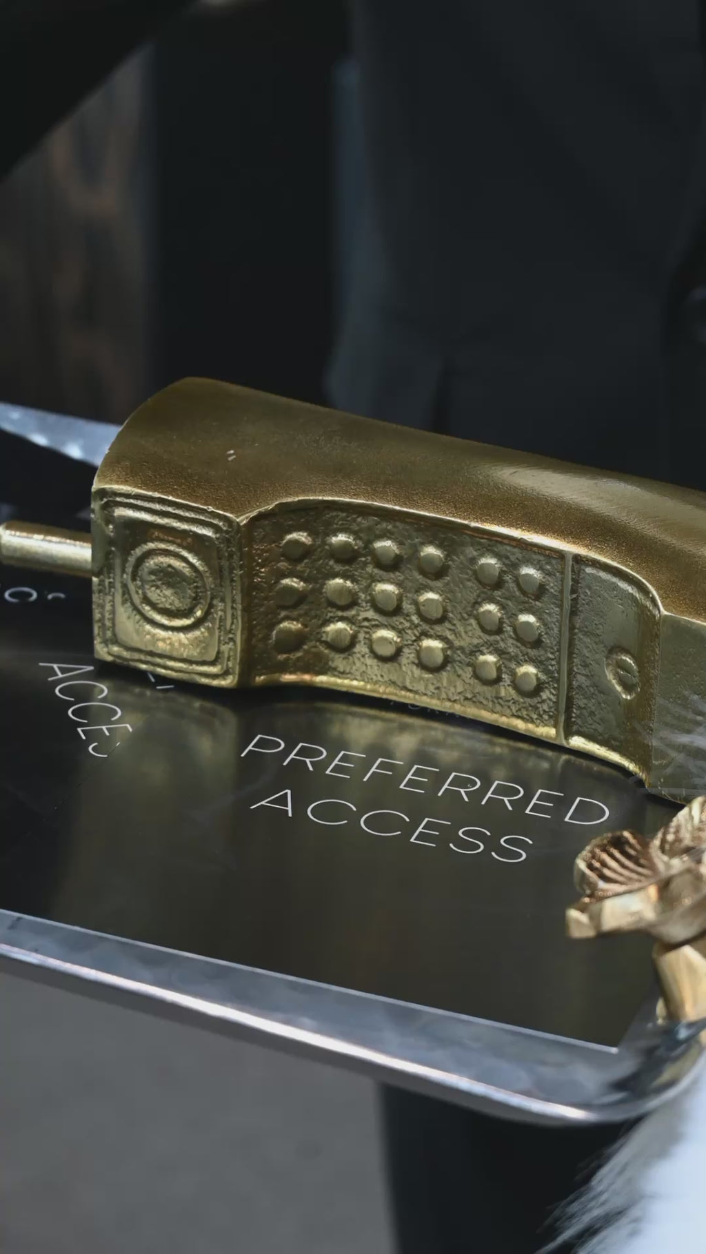 Gold Phone Figurine