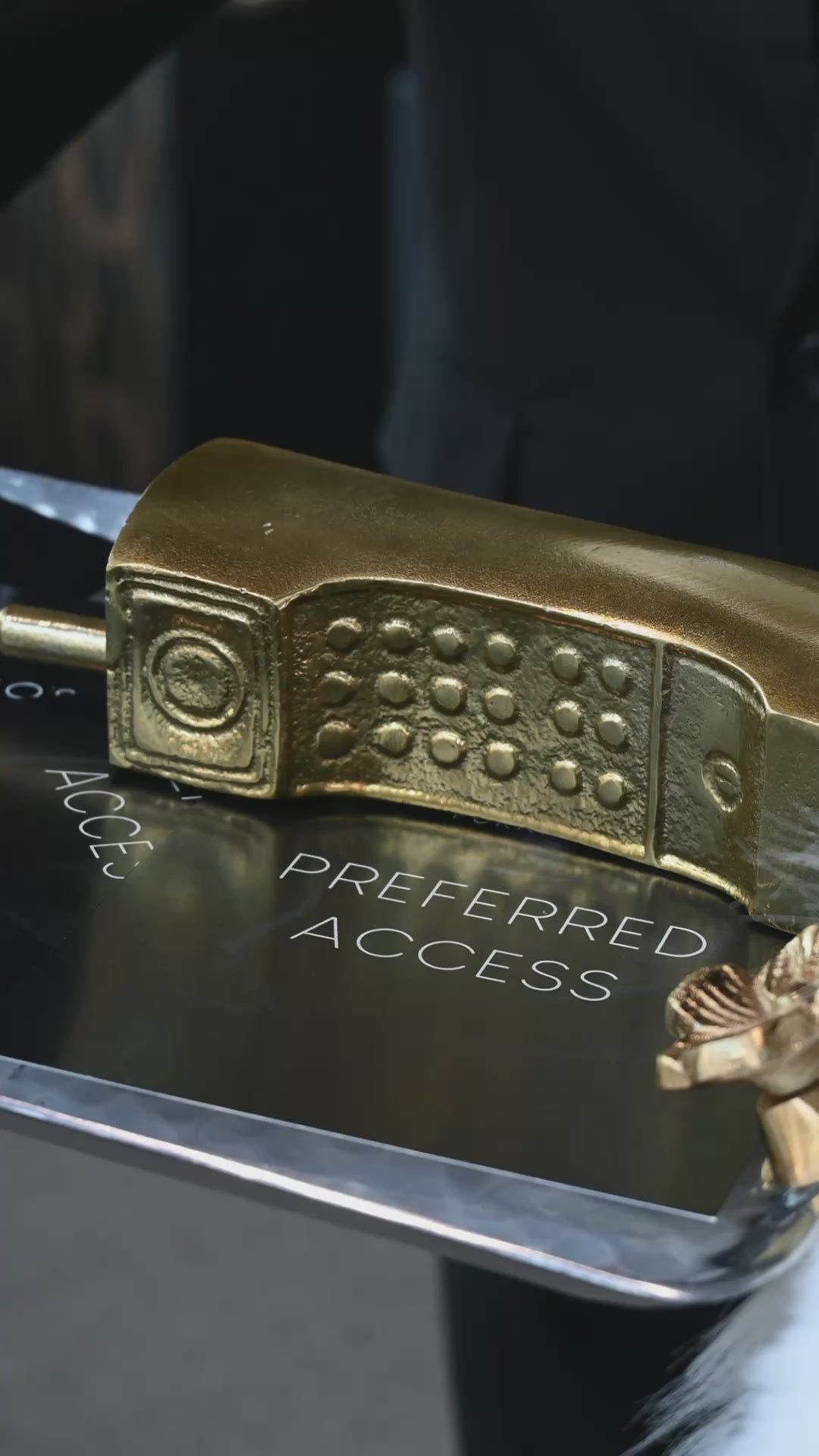 Gold Phone Figurine